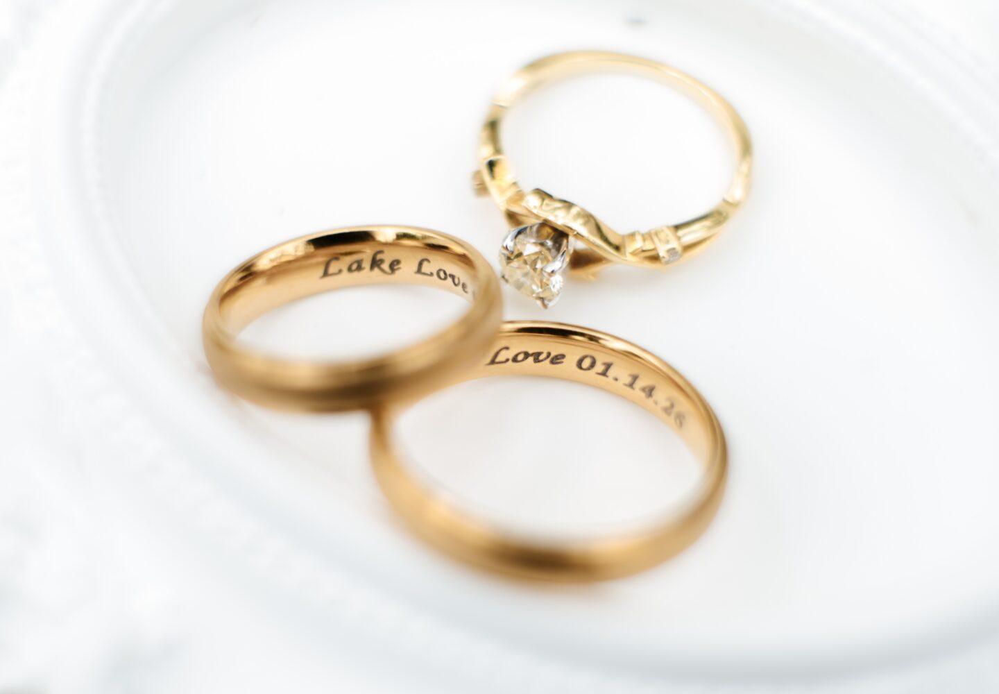 Engraved,Gold,Wedding,Bands,And,Diamond,Engagement,Ring,,Close?up,Of | | | jewelry, piece, stone |Madison Jean Jewelers